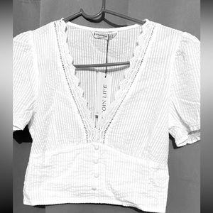 New with tags. Stradivarius top. Color white, size 8(M)
